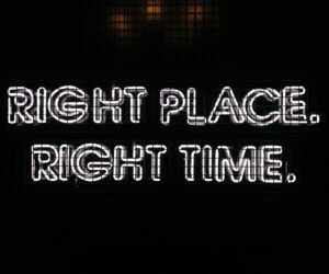 Bright neon sign displaying the text 'Right Place Right Time' against a dark background.